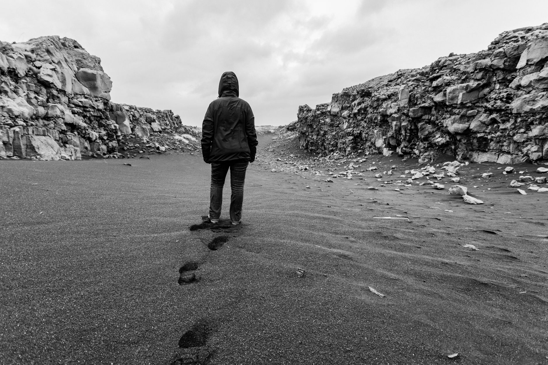 solitary walk through rocky desert landscape